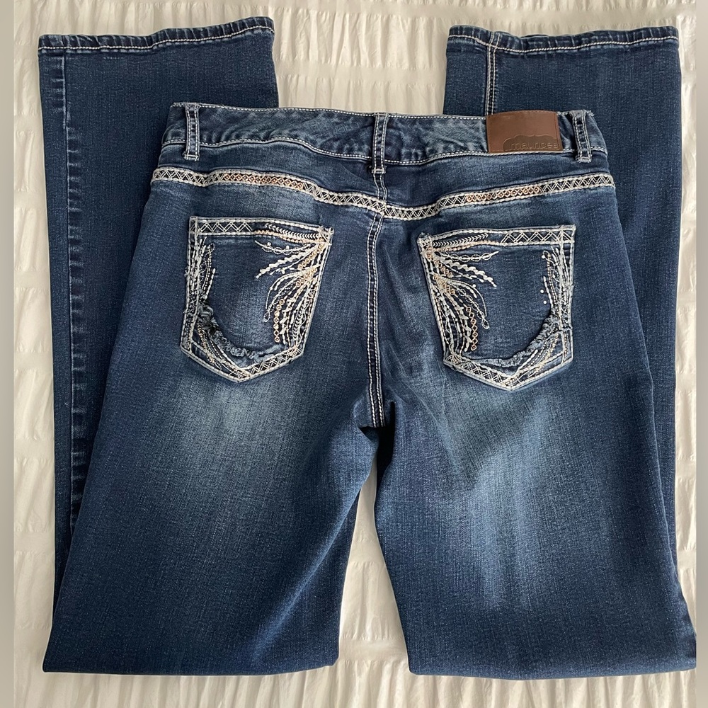 Maurice’s dark denim boot cut mid rise jeans. Size 9/10 regular.